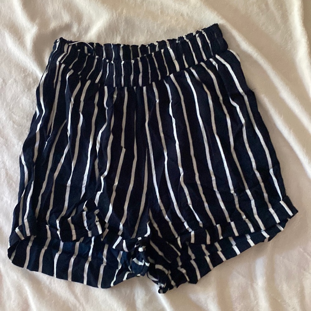 Dark blue and white stripped flowy shorts. Size small.
